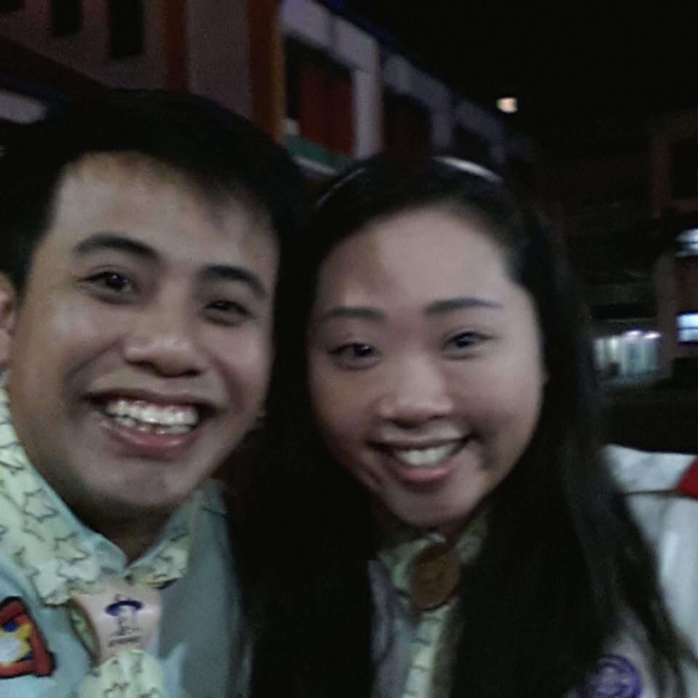 Teck Seng and Li Ting smiling during a Scout outing
