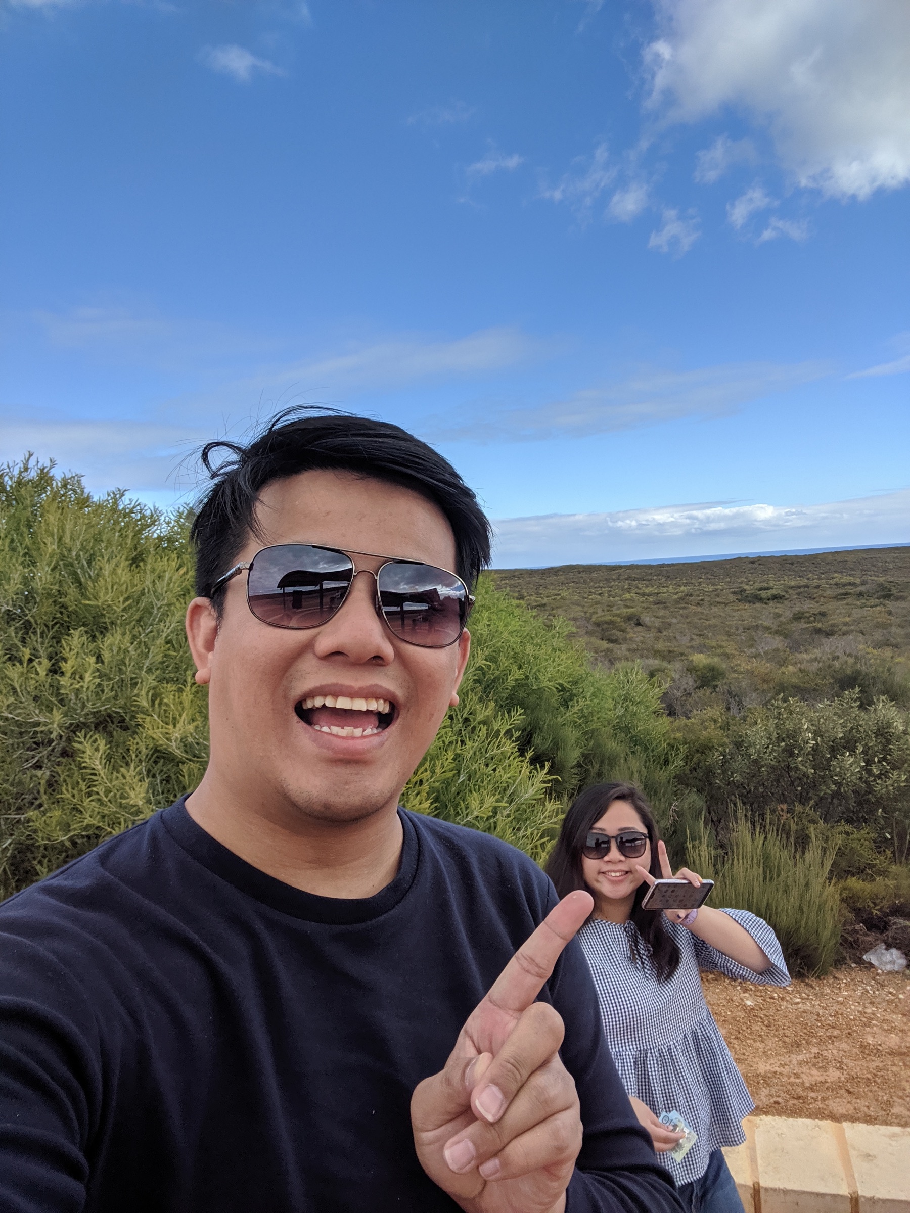 Teck Seng and Li Ting travelling together outdoors